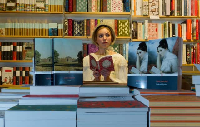 Emma Dubruel, 22, of York, dresssed as Jane Austen, of Pride and Prejudice, in Waterstones, York . A hedge fund is reportedly in talks about a takeover of Waterstones.  Picture James Hardisty
