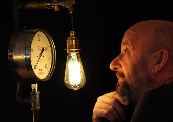 Dave Mattock pictured with his creative lights at Pipe Creative, in Hebden Bridge. Picture by Simon Hulme.