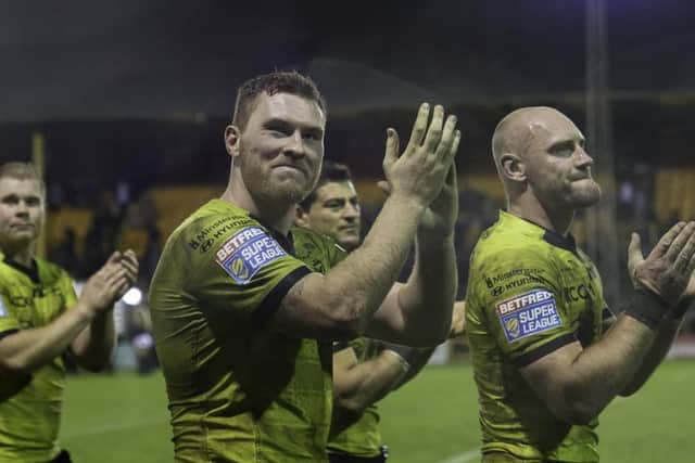 Hull FC's Scott Taylor thanks the fans at the end of the match to celebrate victory over Castleford. Picture: Allan McKenzie/SWpix.com