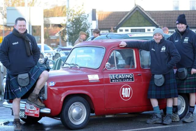 Participants in The Monte Carlo Rally Classique and Historique prepare to leave their overnight stop at the Olde Bell Inn to continue their journey down through the UK and Europe.L-R David Tindal, Alan Faulkner and Stephen Woods with their 1956 Ford Prefect. Picture Scott Merrylees