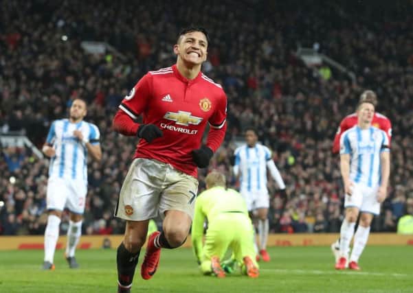 Manchester United's Alexis Sanchez celebrates scoring his side's second goal of the game.