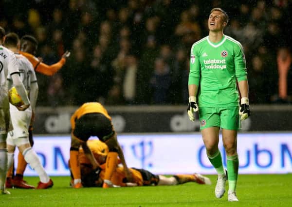 Sheffield United's Simon Moore reacts after being sent off.