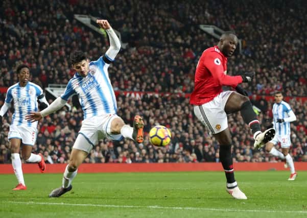 On target: Manchester United's Romelu Lukaku scores his side's first goal.