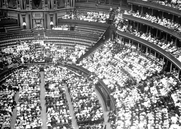 Suffragettes during a mass meeting at the Royal Albert Hall in 1913. Now the centenary of the Representation of People Act will see the launch of a new campaign for electoral reform.