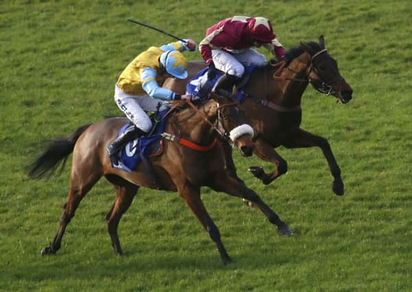 Black Ivory, ridden by Jamie Hamilton (left), was the last winner to be trained by Malcolm Jefferson.
