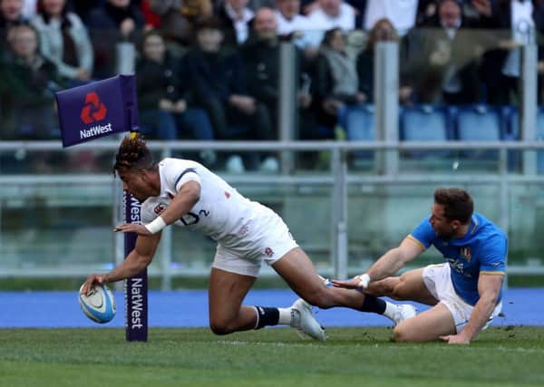 England's Anthony Watson scores his side's second try.