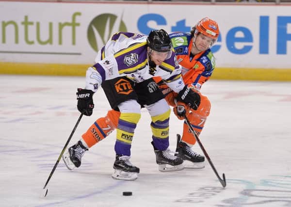 TOUGH TO TAKE: Sheffield Steelers' Levi Nelson, right, in action against Manchester on Sunday night. Picture: