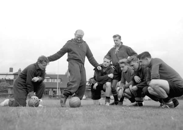Sir Matt Busby, the legendary Manchester United manager, with many of his side's fabled young players.