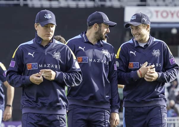 Captains: Yorkshire's Gary Ballance leads his side off the field as Tim Bresnan and Joe Root share a joke.