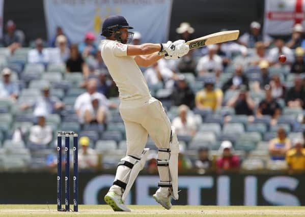 England's Dawid Malan pulls one for four during the Ashes Test match at the WACA in Perth. Picture: Jason O'Brien/PA