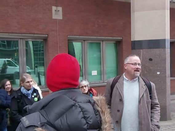 Calvin Payne speaks to his supporters outside Sheffield Crown Court.