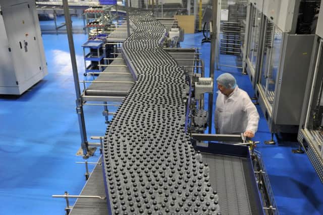 Harrogate Spring Water produces 36,000  bottles  of water in PET Plastic bottles an hour at the production line at their Harrogate plant .