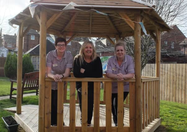 Cherry Tree Gardens care home activity coordinators Lisa Webster and Lisa Glynn, with Sharron Whaley, home manager.
