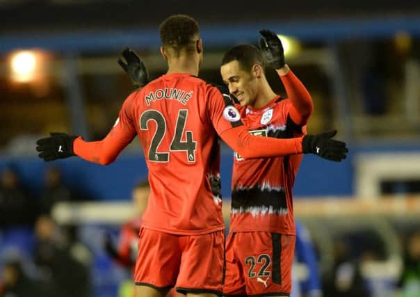 Tom Ince celebrates scoring Huddersfield Town's fourth goal with Steve Mounie (Picture: Bruce Rollinson).