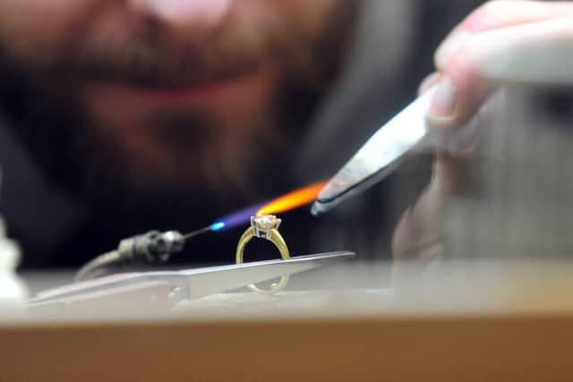 Jeweller John Charmak pictured at work in the workshop. Picture by Simon Hulme.