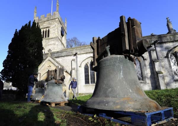 A team of volunteers remove church bells that have been in the bell tower of All Saints Church, Bolton Percy near York since 1603. Photo: John Giles/PA Wire