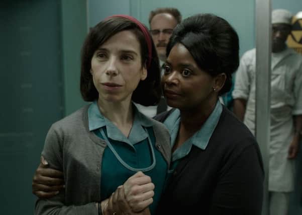 Undated film still handout from The Shape of Water. Pictured: (L-R) Sally Hawkins as Elisa Esposito and Octavia Spencer as Zelda Fuller. See PA Feature SHOWBIZ Film Del Toro. Picture credit should read: Twentieth Century Fox Film Corporation/Fox Searchlight Pictures. WARNING: This picture must only be used to accompany PA Feature SHOWBIZ Film Del Toro.