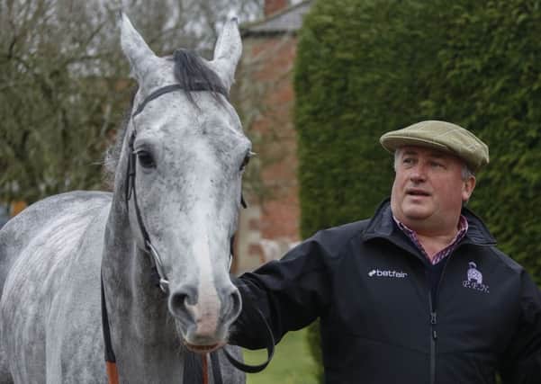 Trainer Paul Nicholls with Politologue.
