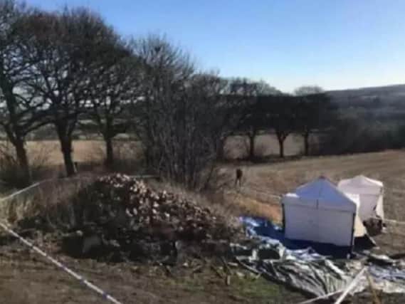 Human remains were found buried on land in Swaithe, Barnsley