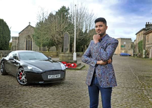 Imran Khan who designs and sells fabulous Asian style and inspired jackets and suits worn by celebs including Amir Khan and David Dickinson. His day job is at sports car dealershipe GC Motors in Harrogate. Picture Tony Johnson.