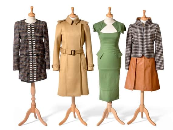 Four of the outfits up for sale, including a Chanel two-piece suits and a Burberry Prorsum camel coat, cashmere blend, (labelled size 42), with Burberry Prorsum clothes protectore Estimate: 150-250.