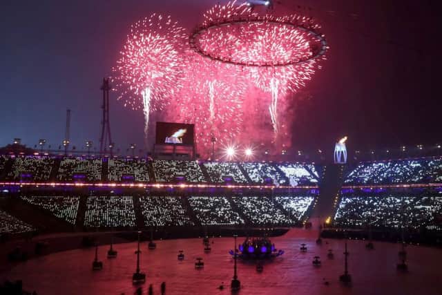 Fireworks are set off as the Olympic torch is lit during the Opening Ceremony of the PyeongChang 2018 Winter Olympic Games at the PyeongChang Olympic Stadium in South Korea.