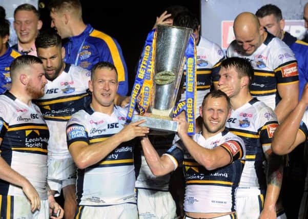 Danny McGuire and Rob Burrow lift the Super League Champions Trophy.
Super League Grand Final 2017: Castleford Tigers v Leeds Rhinos.  Old Trafford.
7 October 2017.  Picture Bruce Rollinson