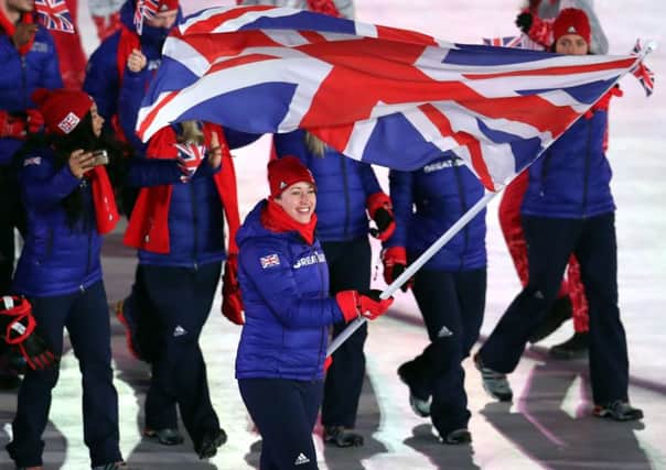 Great Britain's flag bearer Lizzy Yarnold leads out her team during the Opening Ceremony of the PyeongChang 2018 Winter Olympic Games.