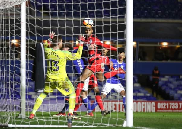 Huddersfield Town's Steve Mounie scores in Tuesday's FA Cup win at Birmingham (Picture: Martin Rickett/PA Wire).
