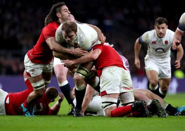 England's Joe Launchbury (centre) in action during the NatWest 6 Nations match with Wales at Twickenham Stadium, London.(Picture: PA)