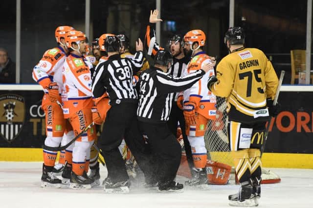 UP CLOSE AND PERSONAL: Steelers' and PAnthers' players have a few words with each other in front of Ervins Mustukovs' net. Picture: Panthers/EIHL