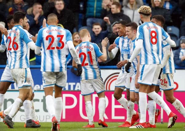 CONFIRMATION: Huddersfield Town's Rajiv van La Parra celebrates scoring a late penalty and his side's fourth goal Stadiuagainst Bournemouth. Picture: Martin Rickett/PA