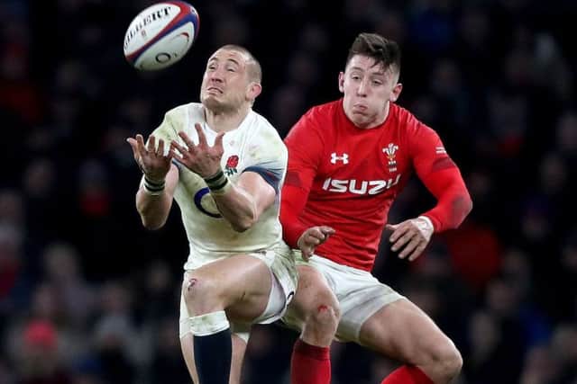 England's Mike Brown (left) and Wales' Josh Adams (right).