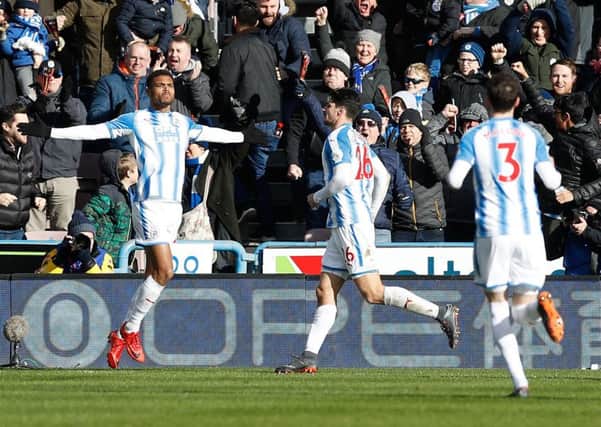 Huddersfield Town's Steve Mounie celebrates scoring the second goal as they beat Bournemouth 4-1 (Picture: Martin Rickett/PA Wire).