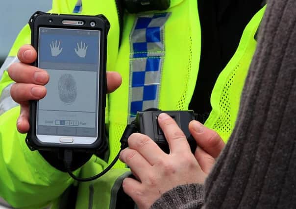 Is the mobile fingerprint scanner a breach of civil liberties?
