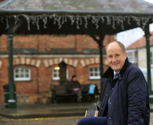221217   Kevin Hollinrake   MP for Thirsk and Malton in front of the market cross  in Easingwold.