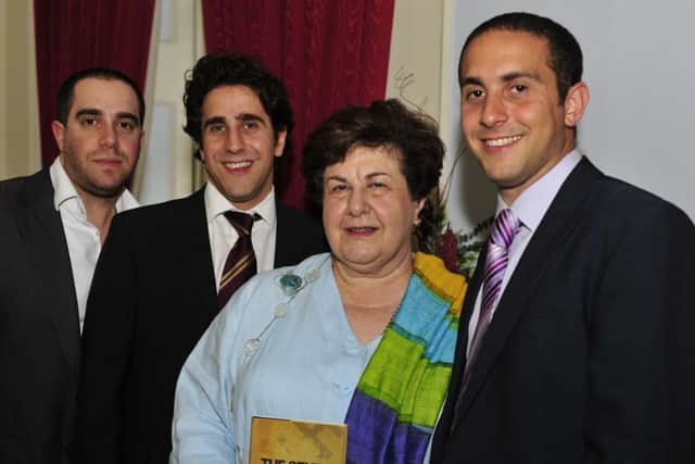 Agnes with her sons in 2011