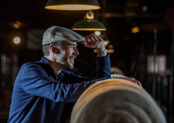 Date: 13th February 2018.
Pictures: James Hardisty.

The traditional Yorkshire flat caps created using Armley Mills Museum's vintage looms could be in line for a top national arts award.  Pictured: Chris Sharp, Community Curator, trying out the museum's very own Yorkshire cap.