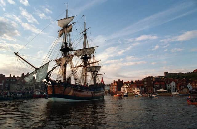 The replica of Cook's Endeavour sails into Whitby Harbour