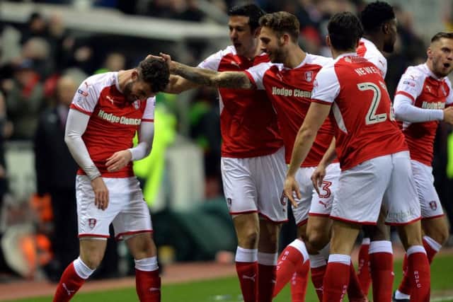 Anthony Forde is congratulated by team-mates after opening the scoring for Rotherham United against Oxford United last night (Picture: Bruce Rollinson).