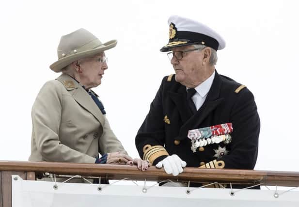 Danish Queen Margrethe and Prince Henrik arrive at Aarhus Harbour aboard the Royal Yacht Dannebrog.