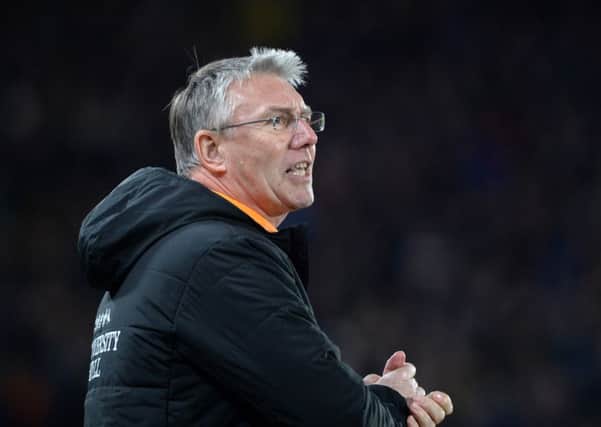 Positive-thinking: Nigel Adkins takes his Hull side to Chelsea  devoid of more than a dozen players through suspension, cup ties or injury. (Picture: Bruce Rollinson)