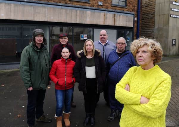 Traders and residents have been hit by bank closures in Wath-upon-Dearne - they are pictured outside a former branch.