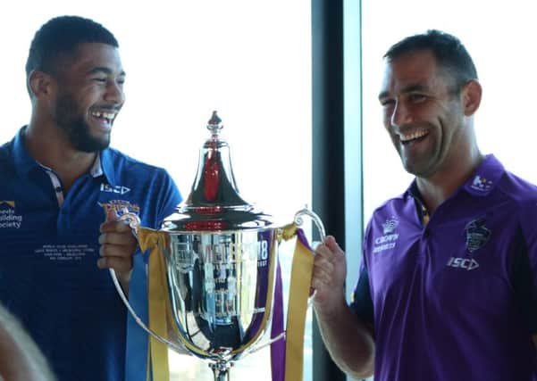 Leading the way: Leeds Rhinos captain Kallum Watkins, left, and Melbourne Storm captain Cameron Smith with the World Club Challenge trophy.
