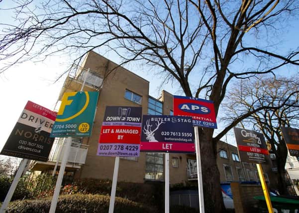 Embargoed to 0001 Friday February 16

File photo dated 17/02/17 of a variety of estate agent signs - Yui Mok/PA Wire