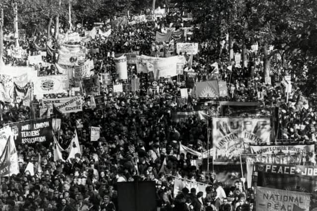 Demonstrators march through Hyde Park during  a CND rally in 1983.