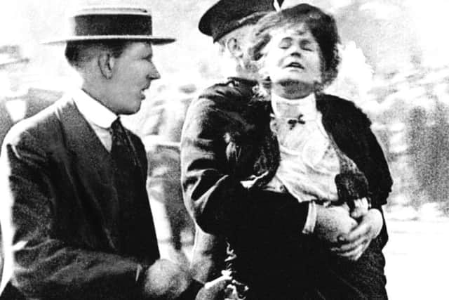 Mrs Pankhurst is arrested during the suffragette struggle. (PA).