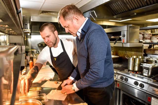 Sir Gary Verity and executive chef Clifton Muil in the kitchens at Tattu.