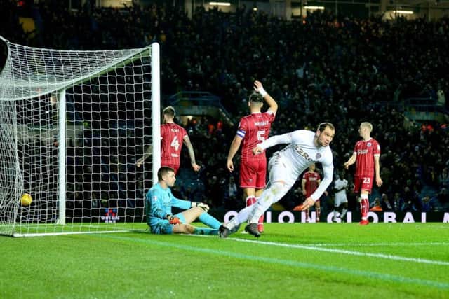 Pierre-Michel Lasogga, of Leeds United, scores the first goal