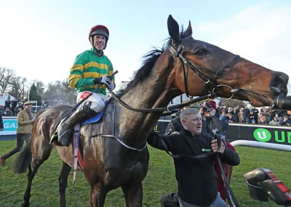 Derek O'Connor and Edwulf in the parade ring after victory in The Unibet Irish Gold Cup at Leopardstown.
